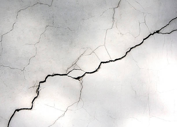 Grunge concrete cement wall with crack ,for your design and texture background